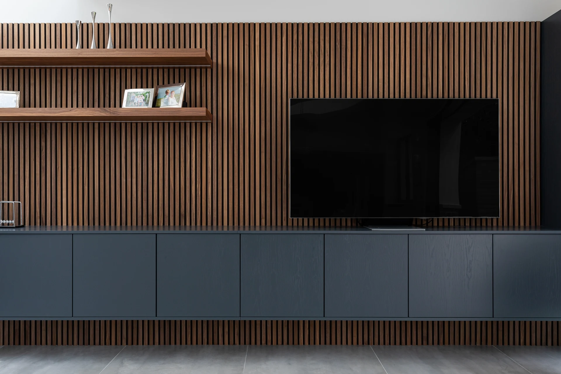 Walnut Slat Wall with TV Unit and Floating Shelves Doran Kitchens