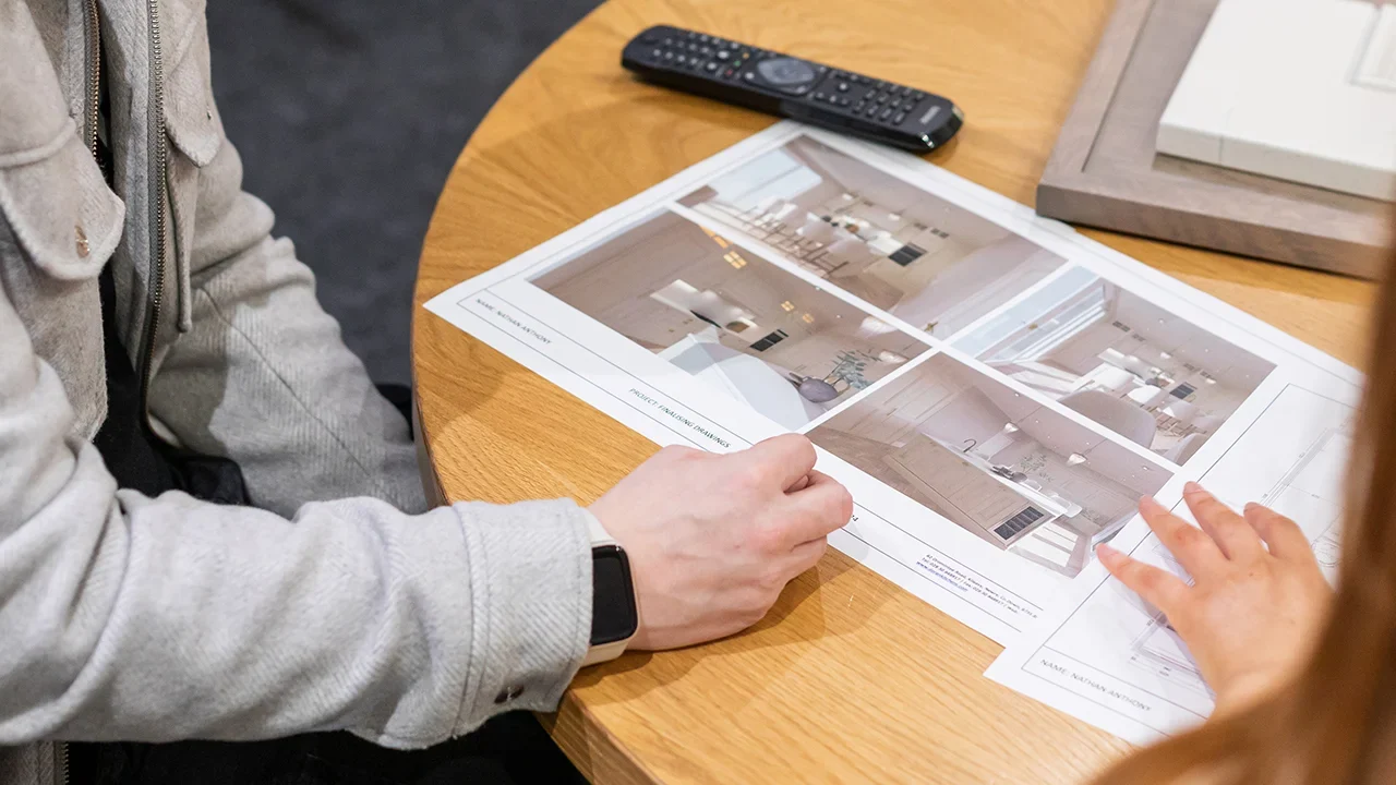 committing-to-project-final-render-review-dorans Client and Design and Sales Consultant Discussing Kitchen Desings