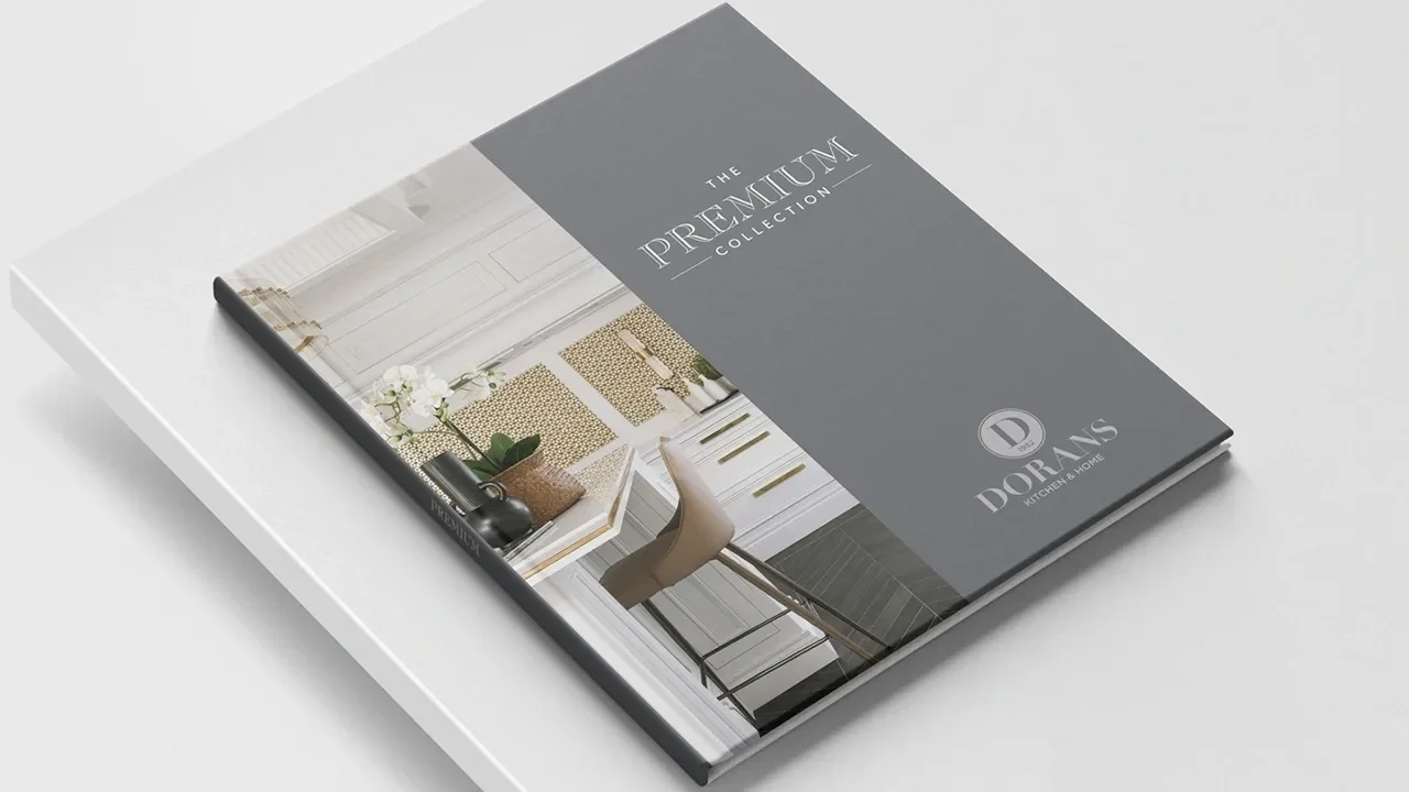 Doran Kitchens Premium Brochure on Light Grey Table Top